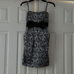 Elegant Black and Silver Dress with Bow.